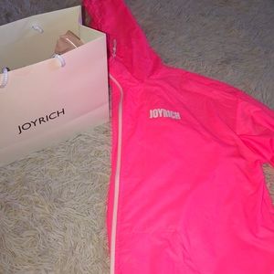 Bright pink joy rich rain coat